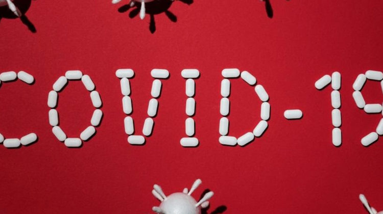 Image of the Coronavirus and the words COVID-19 for a blog post on the boiler industry
