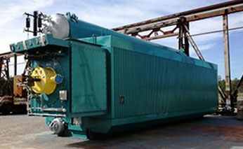 green skid-mounted rental boiler outside